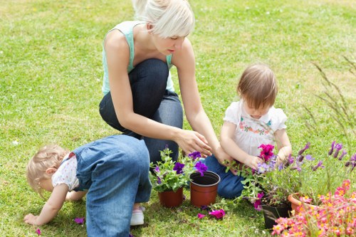 Sorted garden waste bags and separated branches for recycling